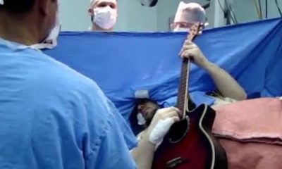 Patient plays guitar on operation table, While undergoing brain surgery patient plays guitar, Musician played guitar, Guitarists, Operation table, Abishek Prasad, Brain surgery, Bengaluru, Karnataka, National news