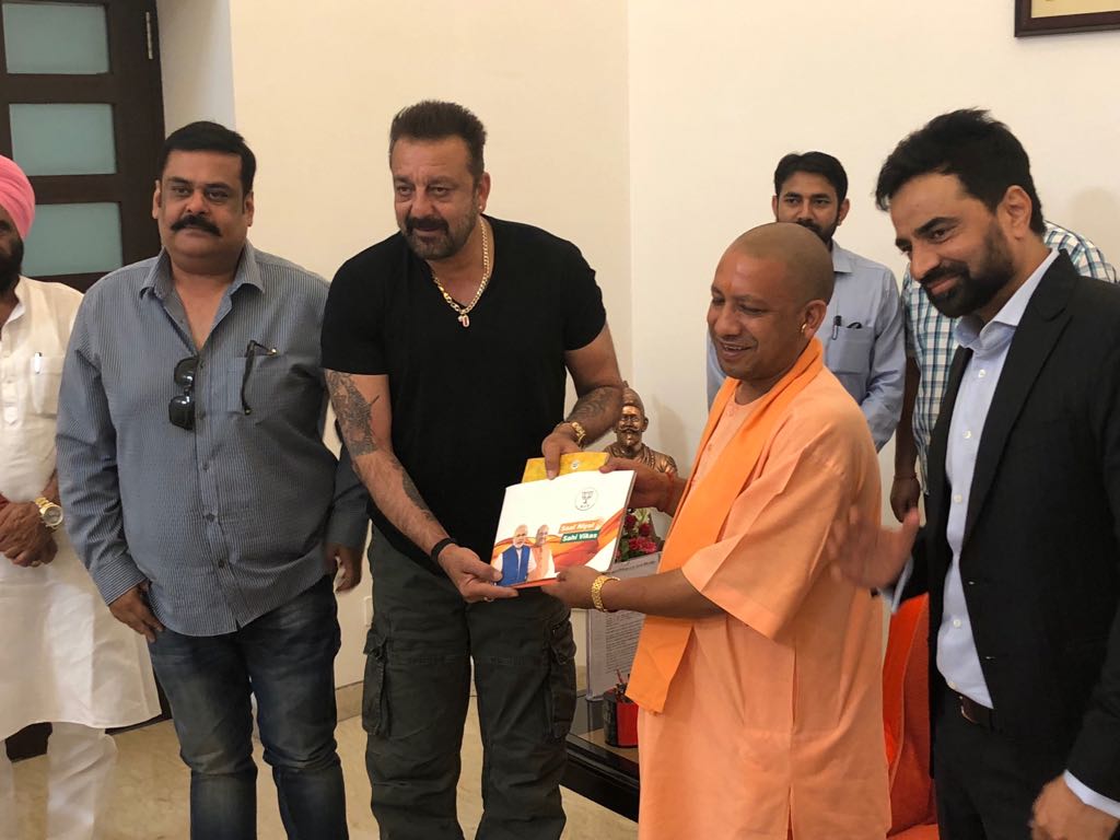 Bollywood actor Sanjay Dutt today met Uttar Pradesh Chief Minister Yogi Adityanath on Saturday to discuss 'Sampark for Samarthan' (contact for support), a personal outreach programme to highlight the achievements of the Narendra Modi-led government in the last four years.